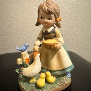 Charming Figurine with Animals